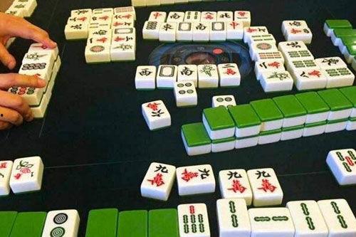 麻将研究河马吃瓜,揭秘麻将中的趣味策略与智慧对决